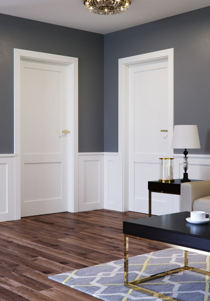 białe drzwi wewnętrzne Porta GRANDE model C.0 ze złotą klamką
